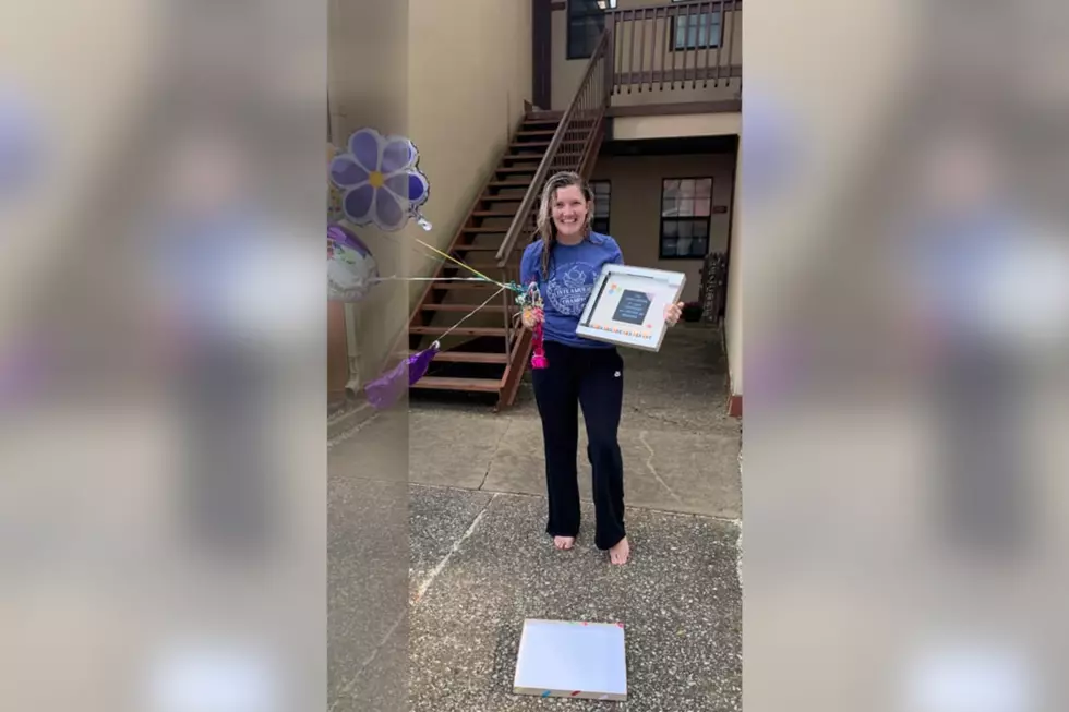 Students Surprise Evansville Teacher with Parade and Photo Book