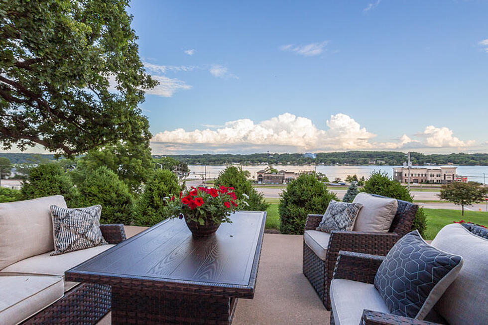 Enjoy Your Own Pool and a River View in this Luxurious Quad-City Lodge
