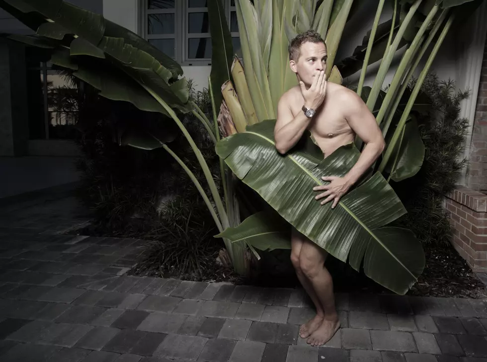 Man covered by a leaf