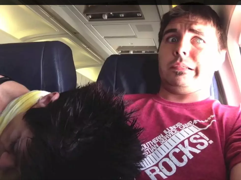 Woman Awkwardly Falls Asleep On A Man’s Lap Mid-flight [VIDEO]