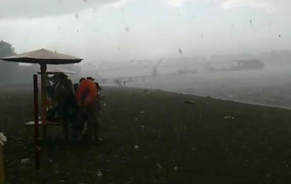 Golf-Ball Sized Hail Crashing Down On Sunny Beach Goers [VIDEO]