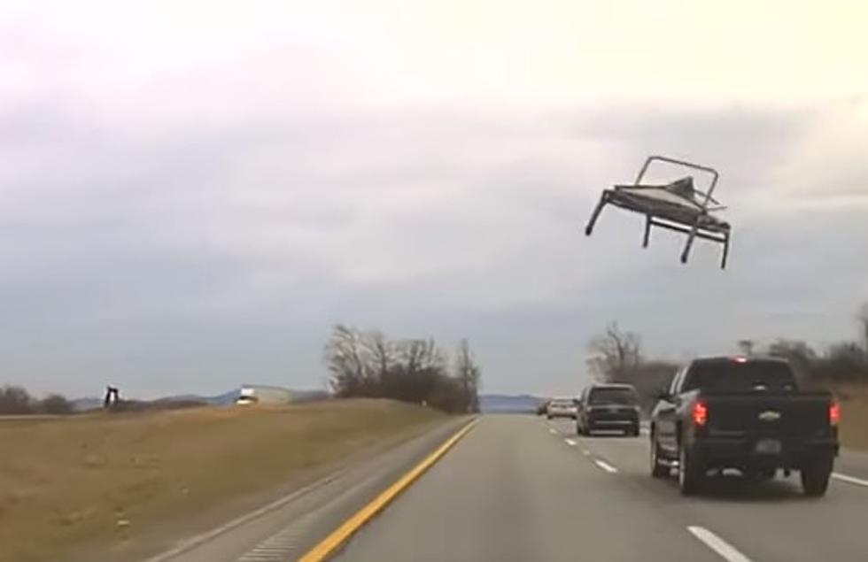 WATCH! Flying Chair Smashes State Police Car Windshield