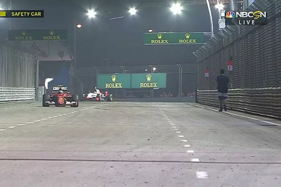 Fearless (And Crazy) Fan Walks Onto Track During Singapore Grand Prix
