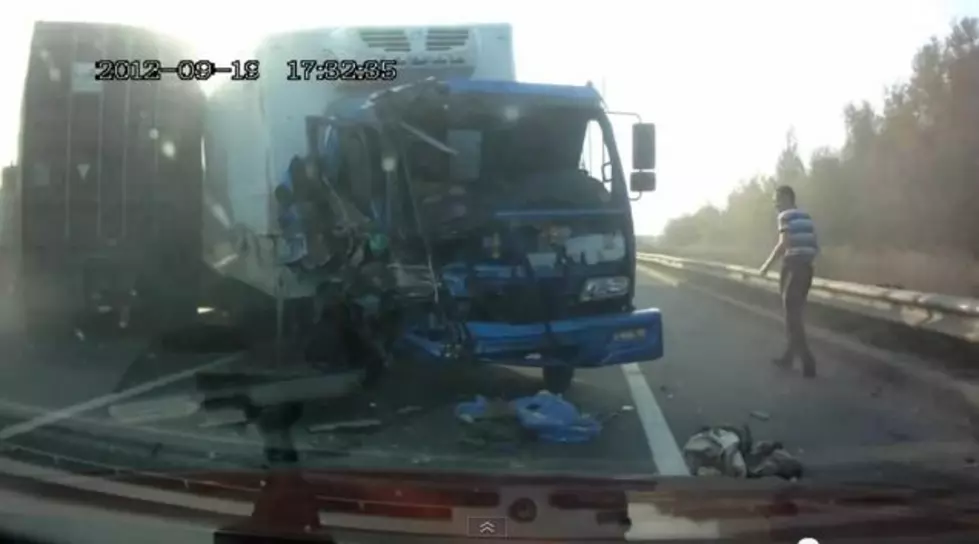 Truck Driver Lands On feet after Nasty Crash [VIDEO]