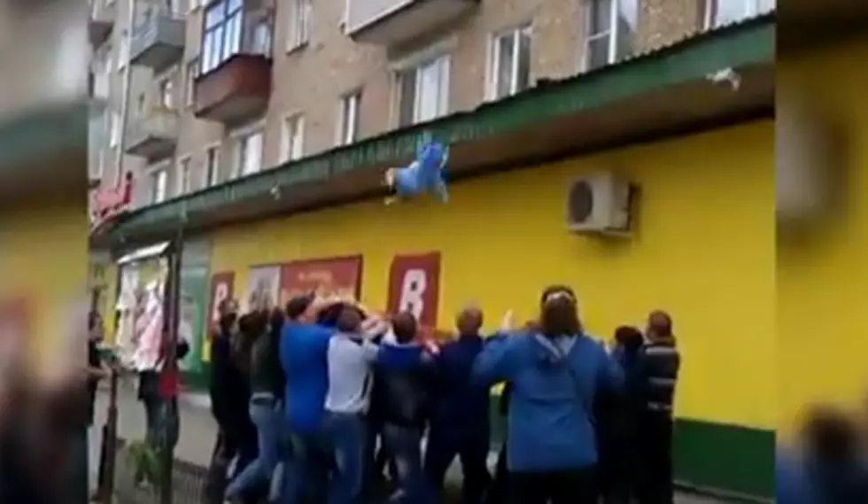 Watch This Family Jump Out of a Window to Escape Fire [Video]