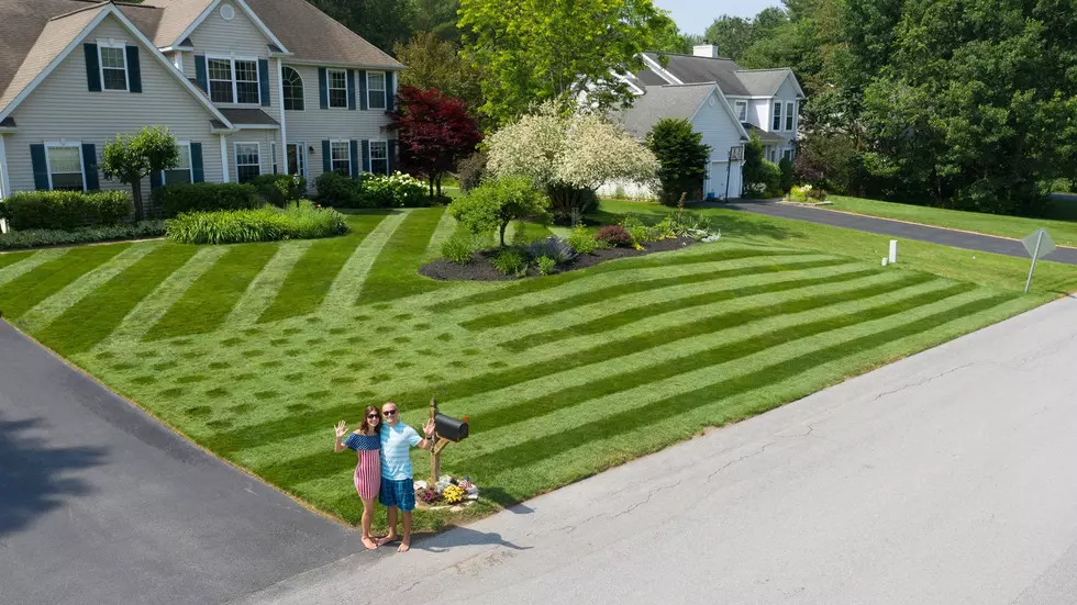 Local Couple Celebrates Fourth of July with Lawn Flag [PHOTO]
