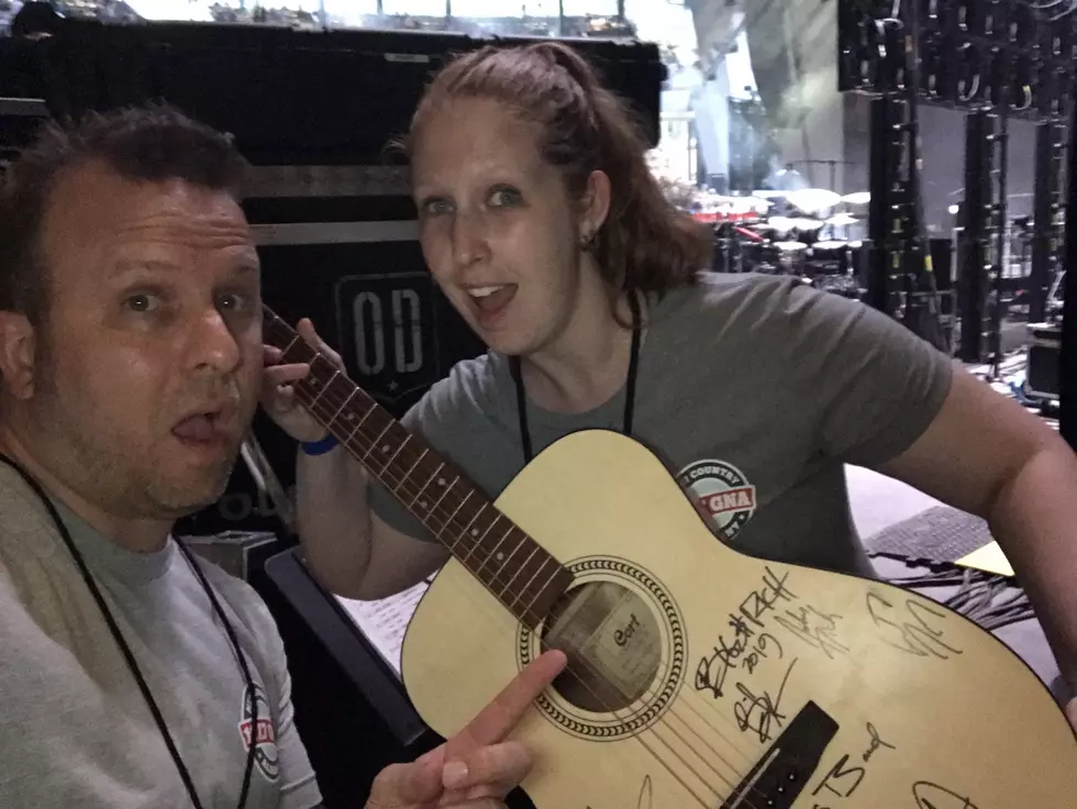 Win a Guitar Signed by Countryfest Artists