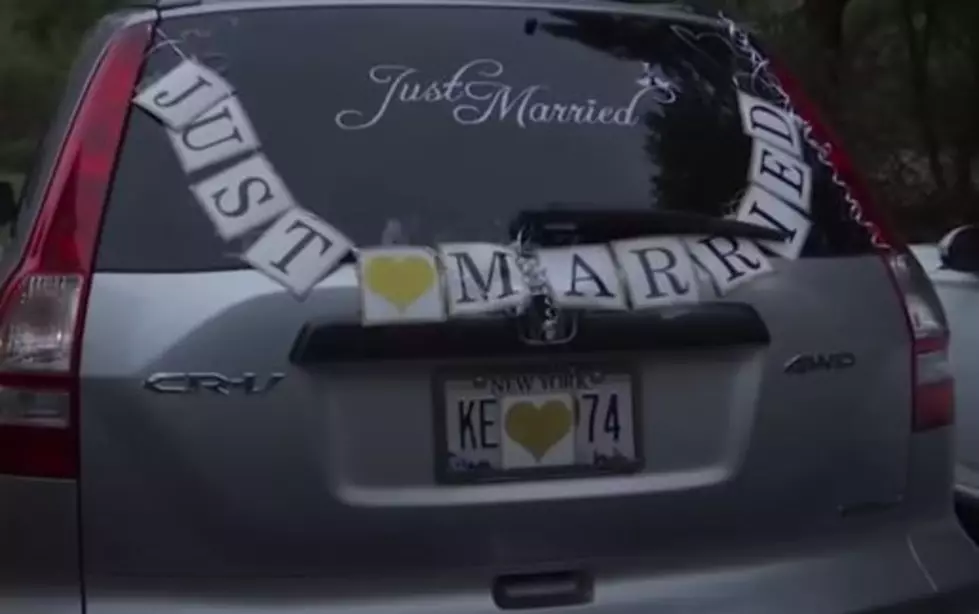 Couple Gets Hitched at Albany Car Dealership