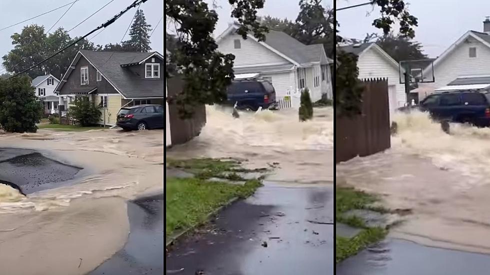 Watch as a Street in Troy becomes Sprawling Raging River in Seconds