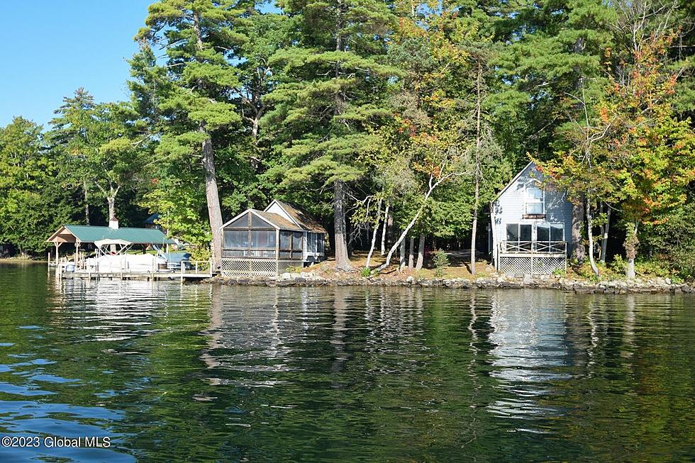 Charming $3.2 Million Cottage on Lake George with 220 feet of Beachfront