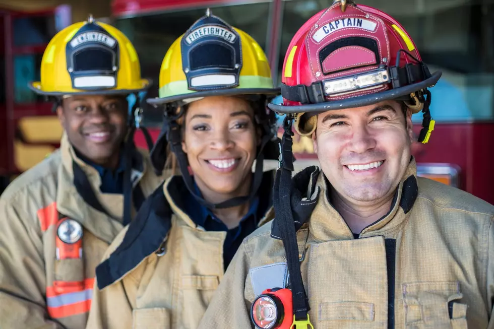 A group of firefighters smiling