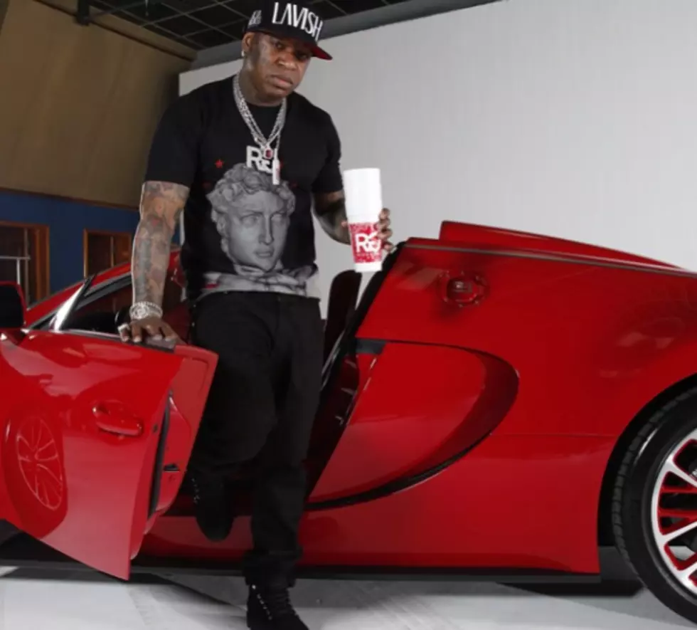 14 Rappers Showing Off Their Sick Whips