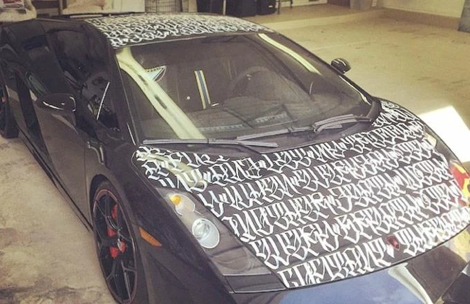 Chris Brown Gets Tupac's “Lord Knows” Lyrics Painted On His Lamborghini -  XXL