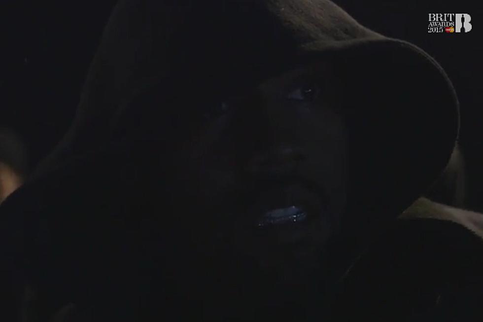 Watch Kanye West Get Into His Zone Backstage at the BRIT Awards