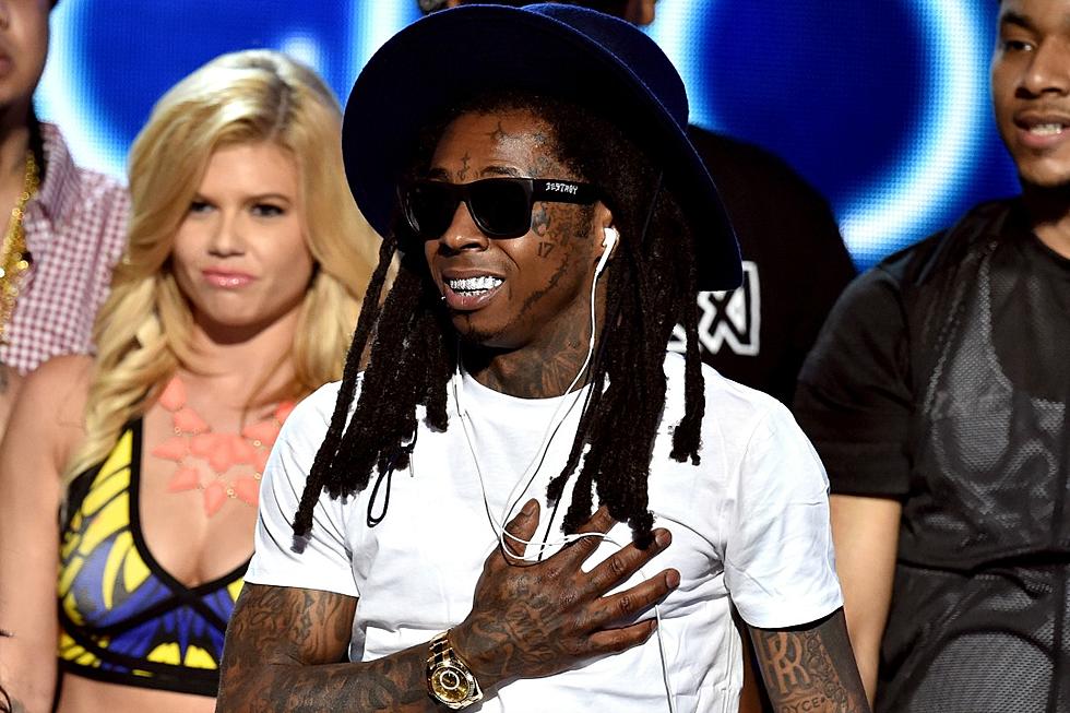 Lil Wayne Denies Spitting on Referee