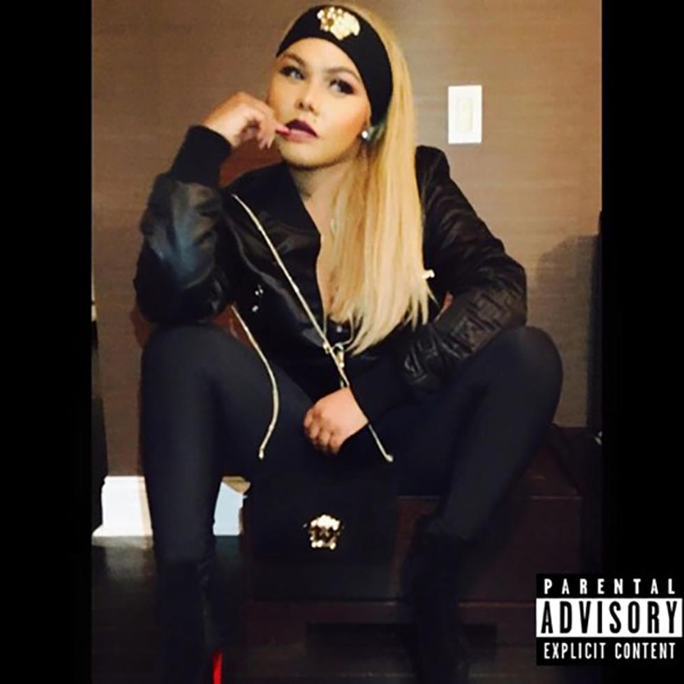 Listen to Lil's Kim, "That Bitch Remix"