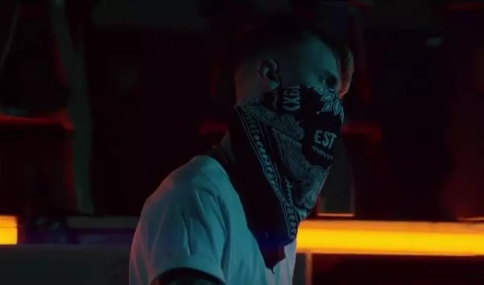 Machine Gun Kelly Is the "Alpha Omega" in New Video