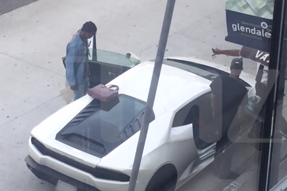 Travis Scott Backs His Lambo Into a Parked Car
