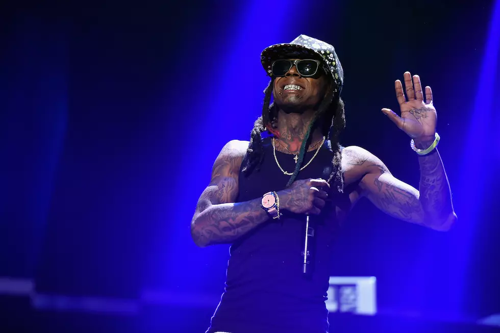 Lil Wayne Disses Cash Money While Performing With Drake