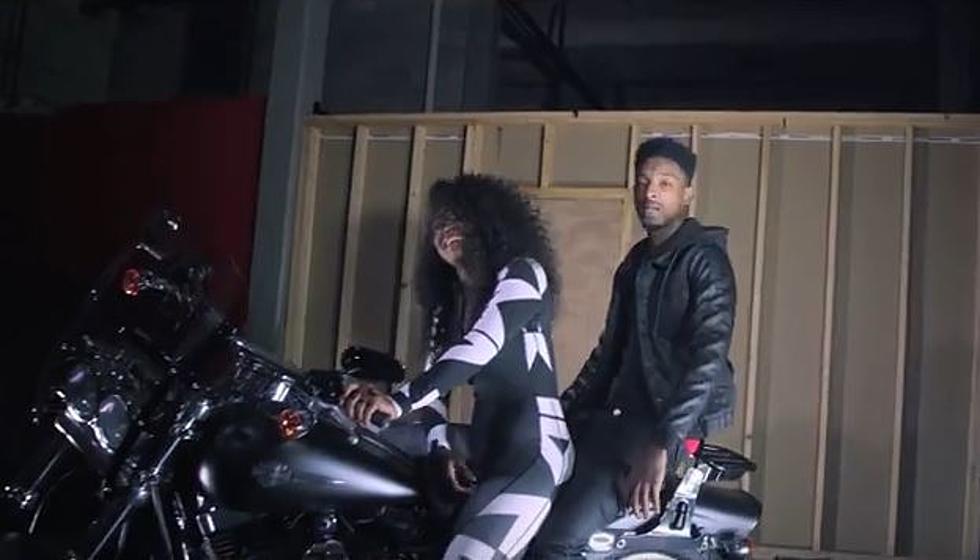 21 Savage Gets Cozy With Dreezy in "Motorcycle" Video