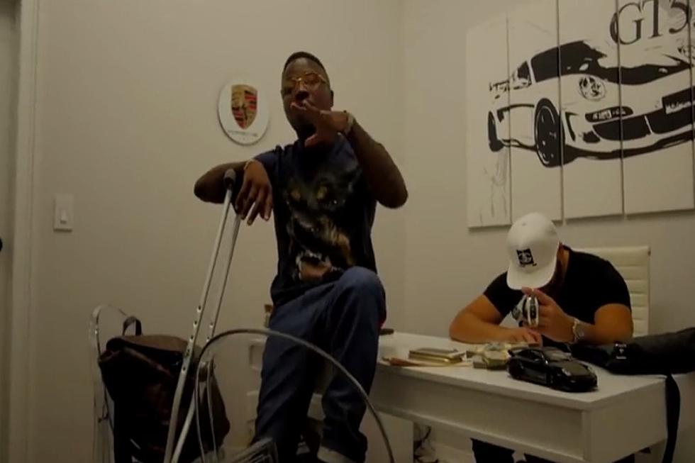 Troy Ave Stunts on Crutches in 'Dealership' Video