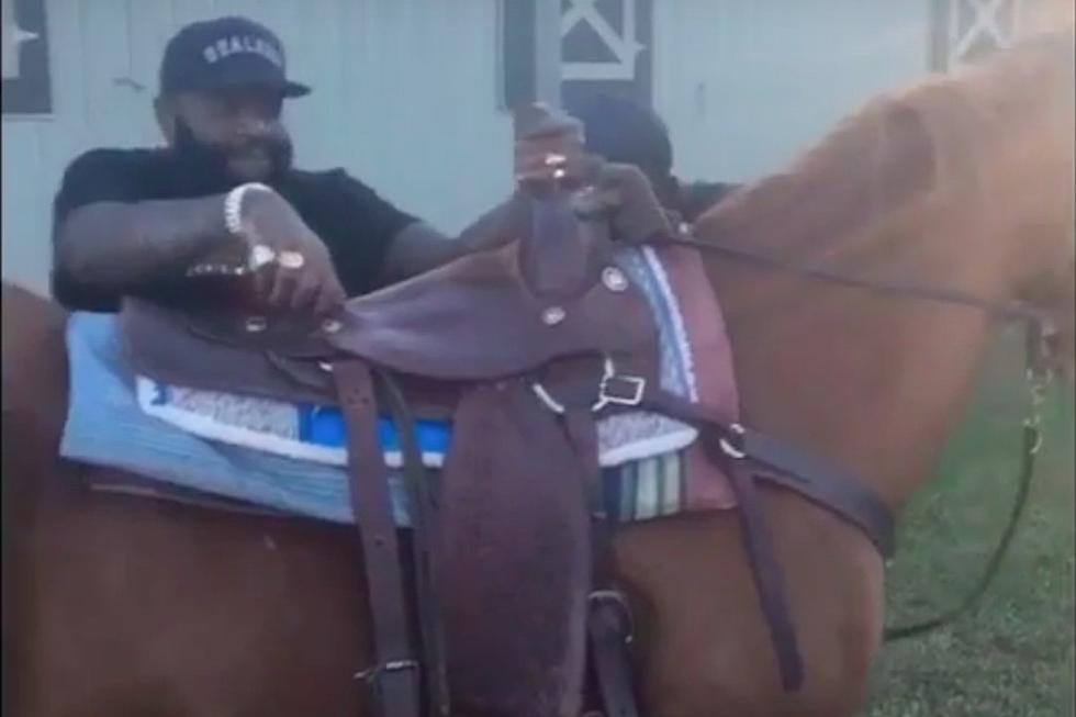 Watch This Hilarious Video of Rick Ross Riding a Horse