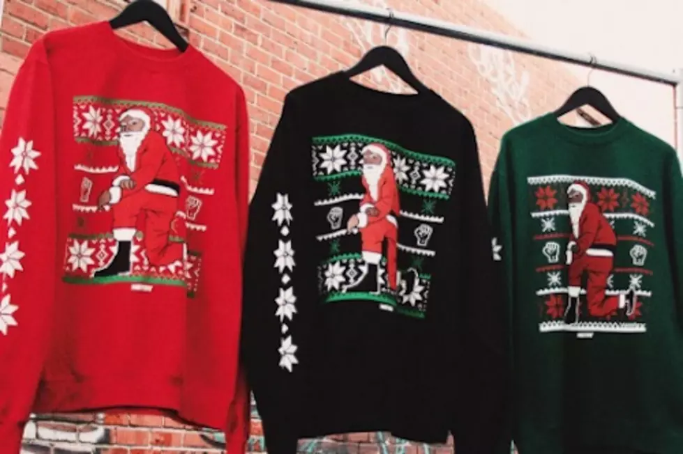 Nas Selling Sweaters Featuring a Kneeling Santa