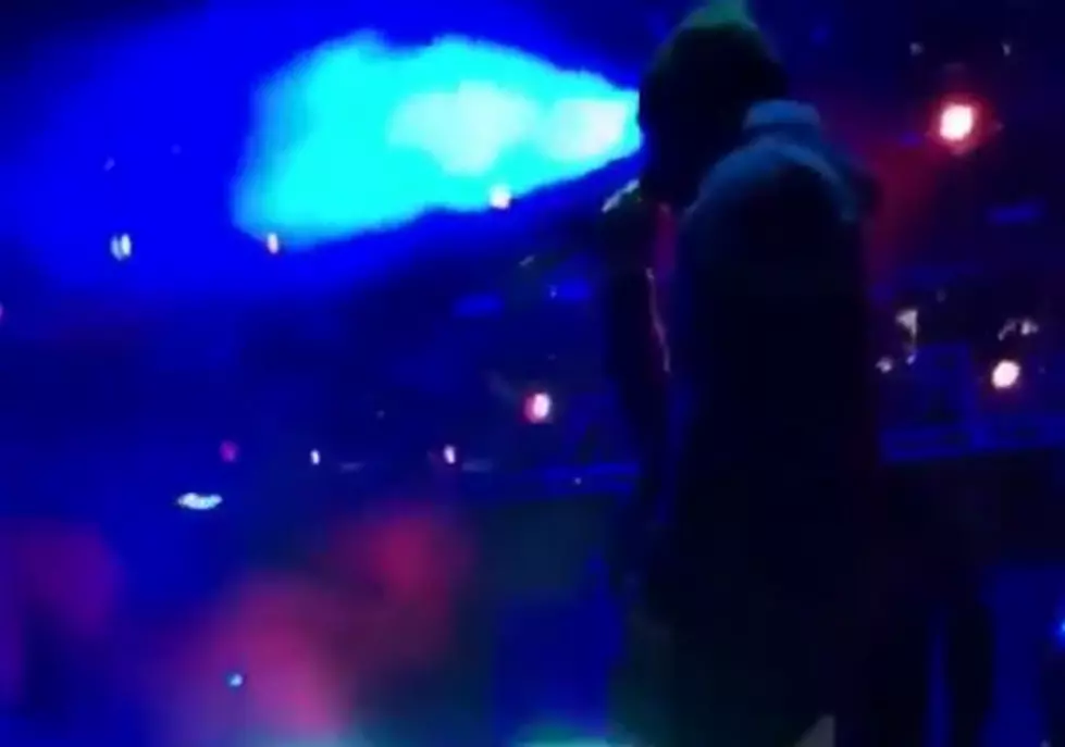 Travis Scott Goes Off on Security Guard for Taking Mic Out of Fan’s Hand During Show
