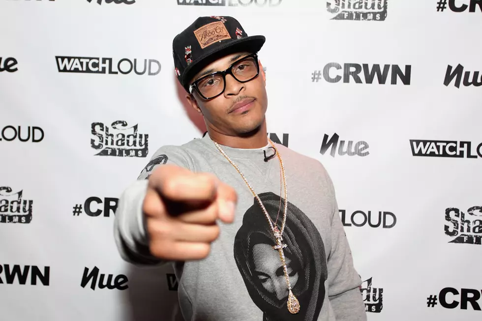 T.I. Tells Overzealous Fan He’s Getting Too Close While Pumping Gas