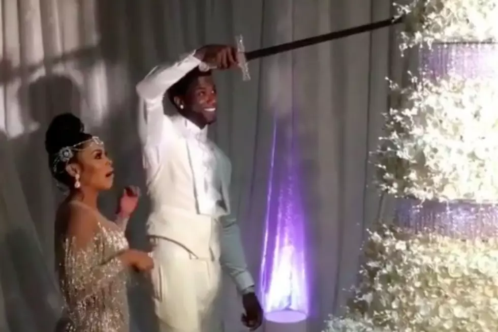 Watch Gucci Mane Cut His $75,000 Wedding Cake With a Sword