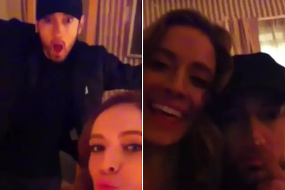 Eminem Caught Kissing Mystery Woman in Leaked Video