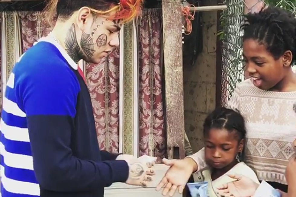 6ix9ine Hands Out Money to Children in the Dominican Republic