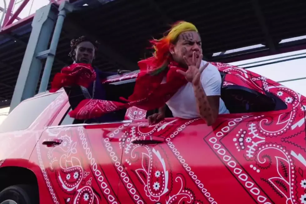 6ix9ine Rides Around in Bandana-Wrapped SUV in "Tati" Video