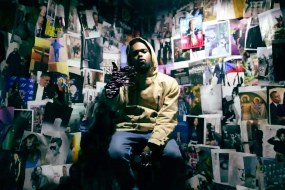 Kembe X Raps in a Room Full of Photos in “Goofass” Video