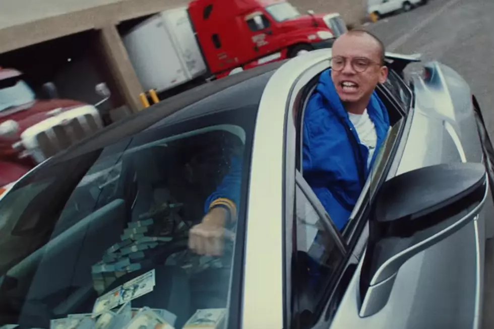 Logic Sets His Money on Fire in New &#8220;Contra&#8221; Video