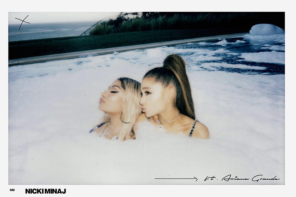 Nicki Minaj Taps Singer Ariana Grande for New Song “Bed”