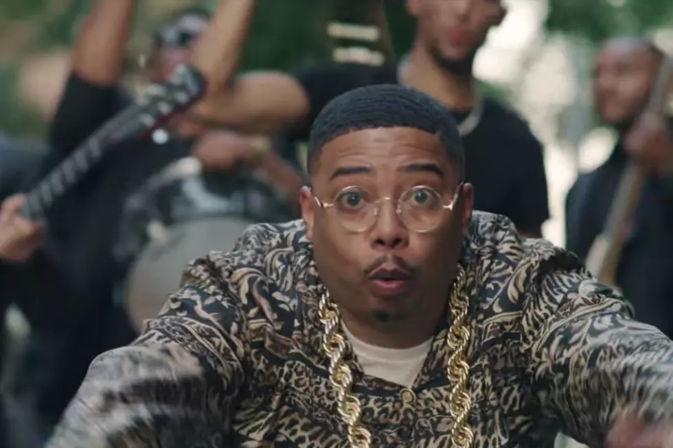 Manolo Rose Leads a Marching Band in New “I Get Money” Video