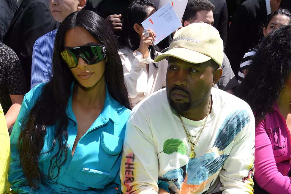 Kim Kardashian Insists Kanye Was Using Phone for Notes at 'Cher'