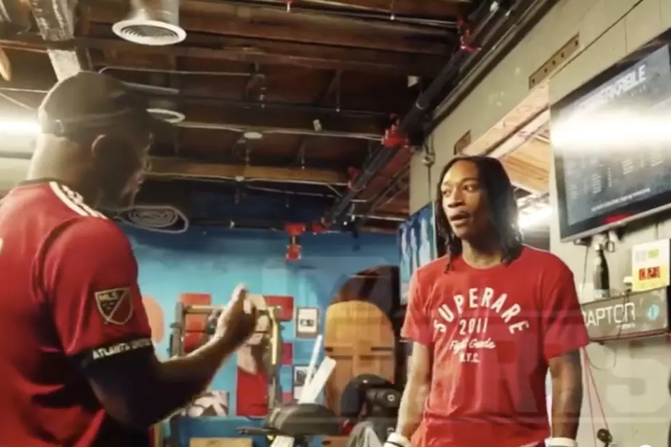 Watch Wiz Khalifa Get Boxing Lessons From Evander Holyfield