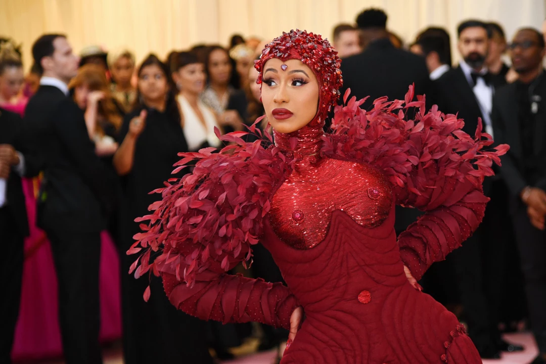 cardi b in a red dress