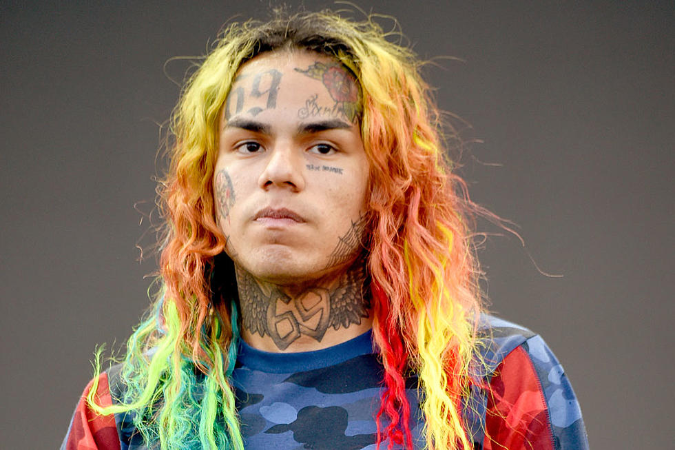 6ix9ine Says He Broke His Arm After Tripping Over His Dog