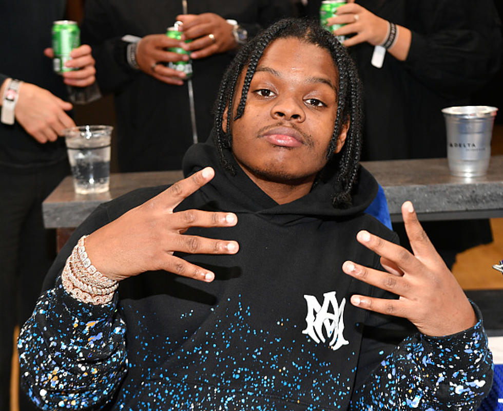 Rapper 42 Dugg attends the Boston Celtics v Atlanta Hawks game at State Farm Arena on November 17, 2021 in Atlanta, Georgia.