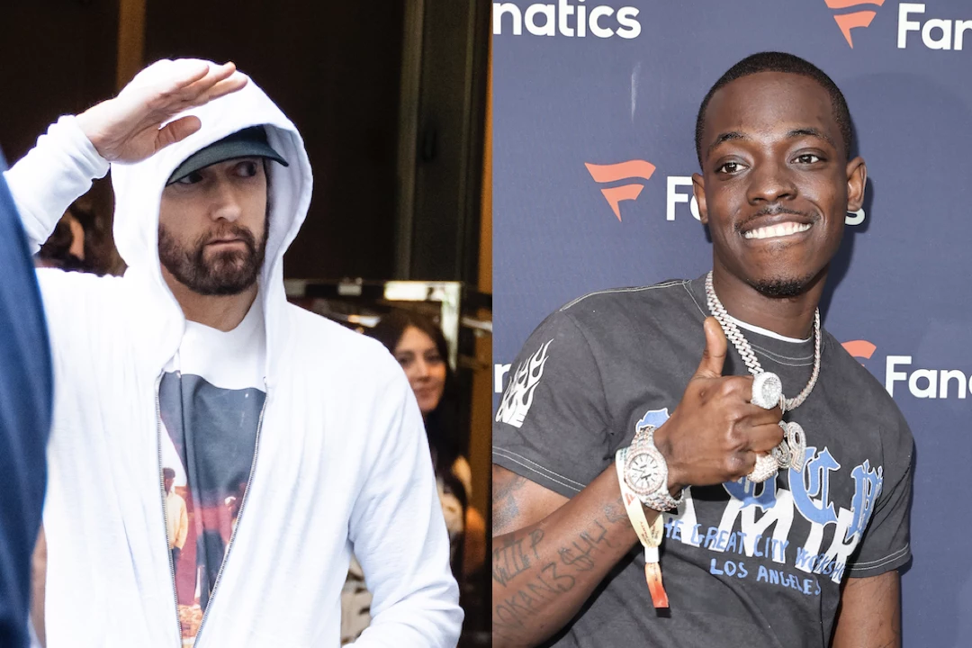 Amir Khan tells fan to 'shut the f*** up' after awkward video of ex-boxer  giving Eminem luxury watch at Fury vs Ngannou | The Sun