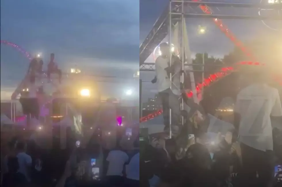 Travis Scott Stops Show and Demands Fans Who Climbed Truss to Get Down &#8211; Watch