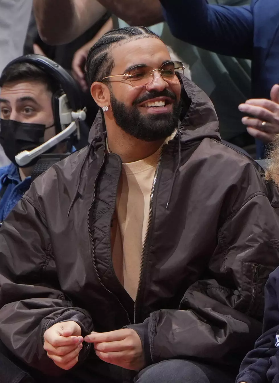 Rapper, Drake and Fuse News Host, Matte Babel, look on while attending the  Round 1 Game 5 of the 2022 NBA Playoffs between the Philadelphia 76ers and the Toronto Raptors on April 28, 2022 at the Scotiabank Arena in Toronto, Ontario, Canada.