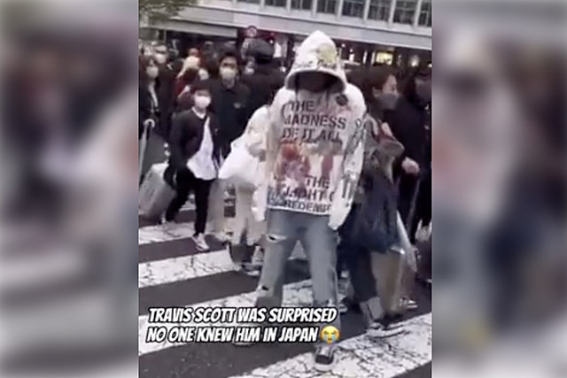 Travis Scott Stands in Crowd of People in Japan, No One Notices