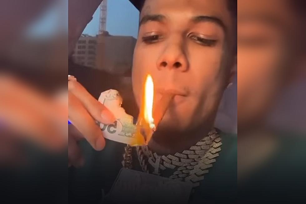 Blueface Lights Blunt With $50 Bill &#8211; Watch