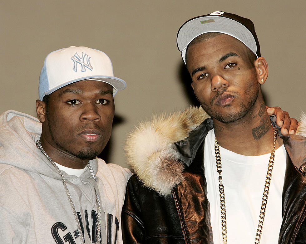 NEW YORK - MARCH 9: (L-R) Rappers 50 Cent and The Game make an appearance at the Schomburg Center For Research in Black Culture to announce they will put their differences aside and make amends on March 9, 2005 in New York City.  