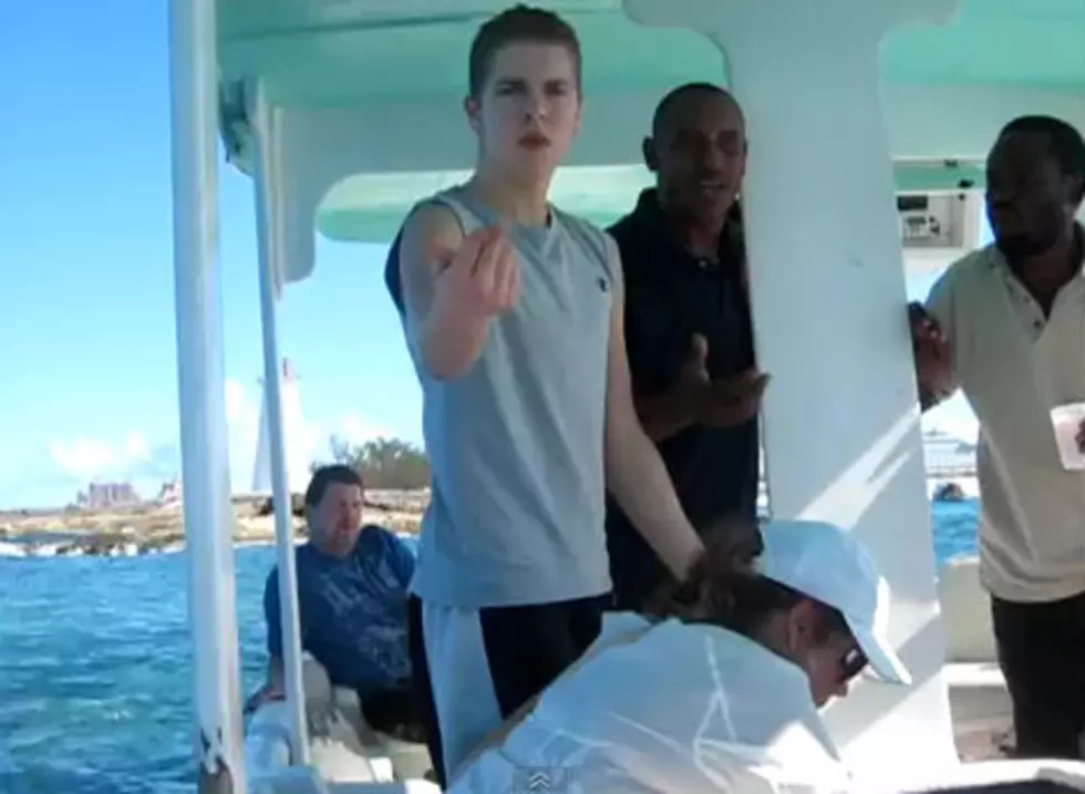 Kid Freaks Out and Gets Thrown Off a Boat