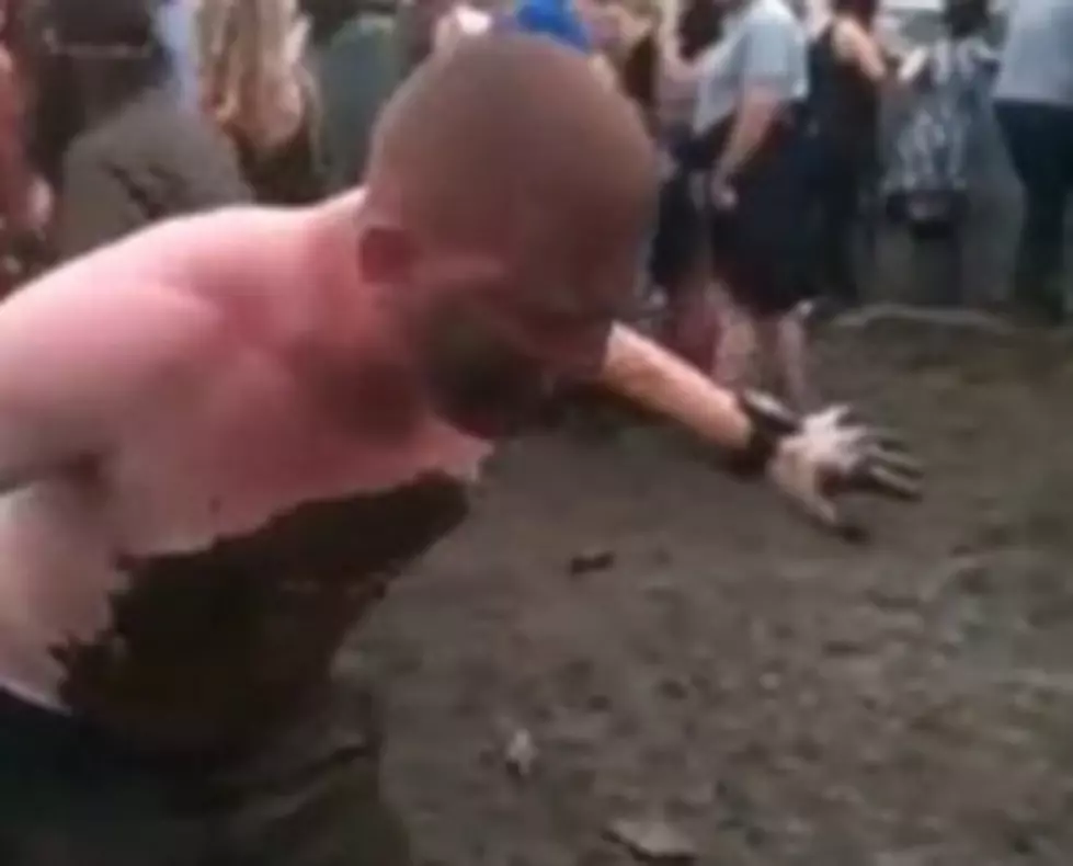 Festival Mud Slider Gets a Face Full of Pee [VIDEO]